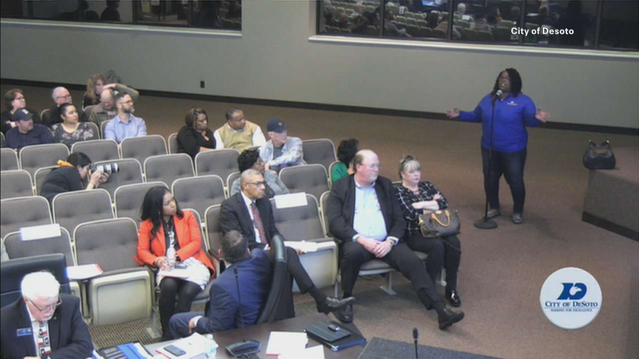 Angry DeSoto residents speak out about council member whose husband