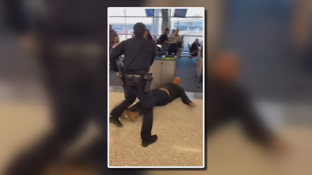 DFW Airport police use Taser on unruly traveler, but still need help from others to control him