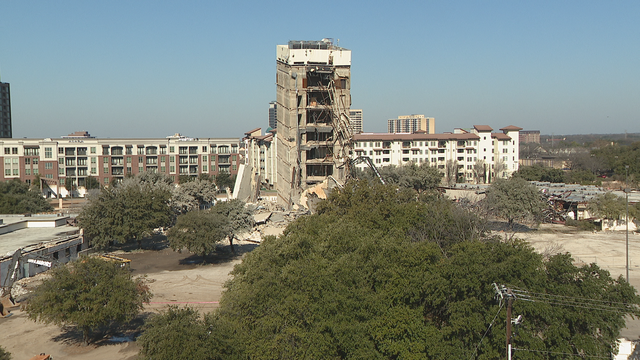 The 'Leaning Tower of Dallas' to stay up at least one more day