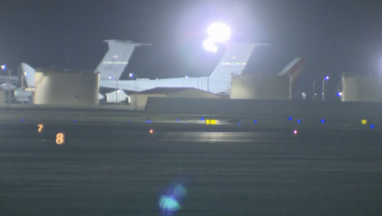 One of two planes lands at Travis Air Force base with coronavirus evacuees. Feb. 5, 2020