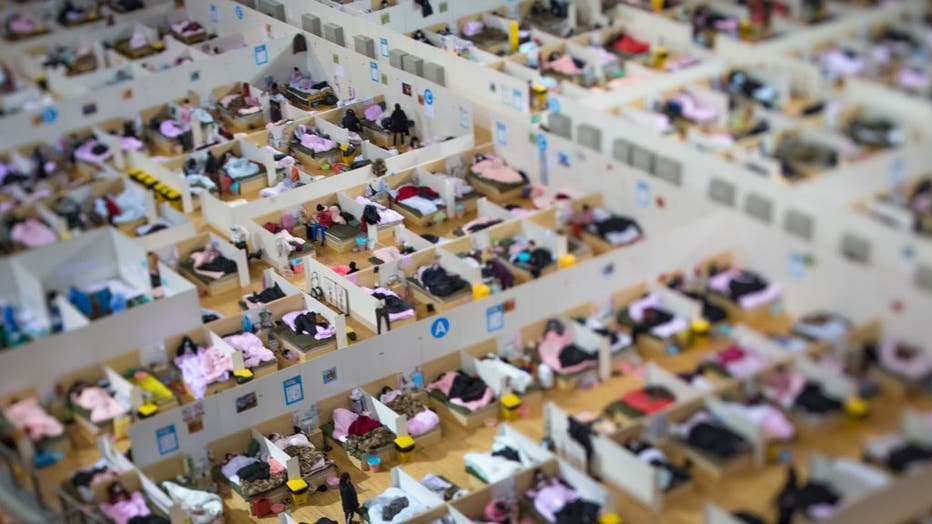 WUHAN, Feb. 17, 2020 -- Photo taken on Feb. 17, 2020 with a tilt-shift lens shows a temporary hospital converted from Wuhan Sports Center in Wuhan, central China's Hubei Province. The temporary hospital converted from Wuhan Sports Center designated to treat the COVID-19 patients in Wuhan has been in good order since the hospitalization of its first batch of patients on Feb. 12. (Photo by Xiao Yijiu/Xinhua via Getty) (Xinhua/Xiao Yijiu via Getty Images)