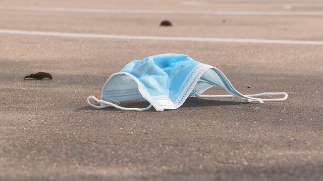 Protective masks, gloves starting to litter North Texas parking lots