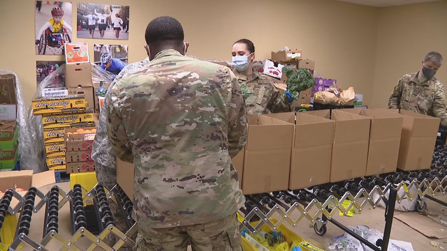 Air National Guard, Cowtown Marathon help Tarrant Area Food Bank pack food for families in need