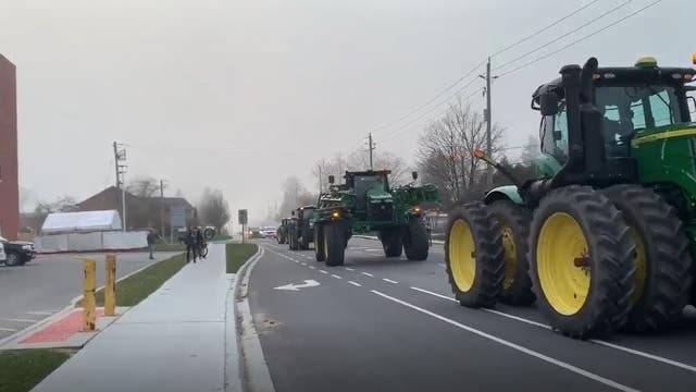 Canadian farmers salute health care workers fighting COVID-19 with tractor parade