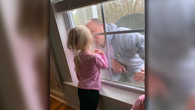 firefighter daughter kiss window