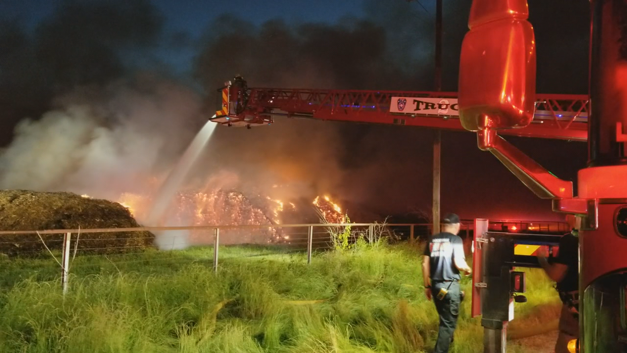 Fire smoldering at mulch business in Terrell