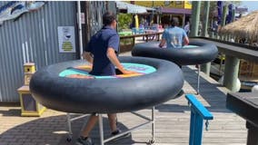 Ocean City bar promotes social distancing with giant inflatable inner tube tables