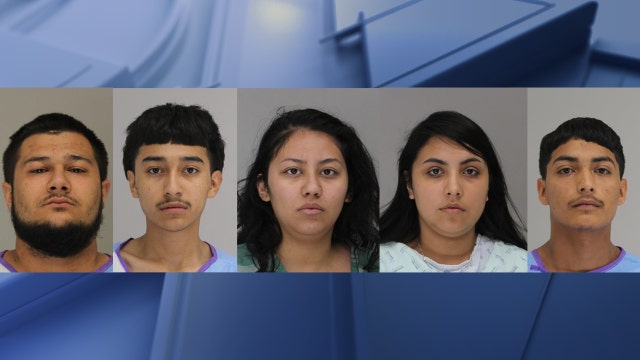 Dallas police arrest 5 suspects after 2 found murdered in parking lot