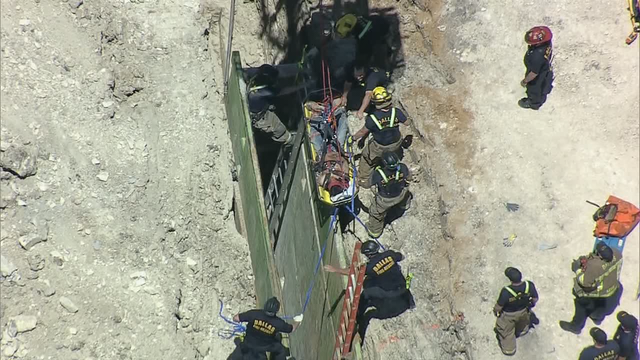Crews rescue worker from ditch that collapsed in Dallas