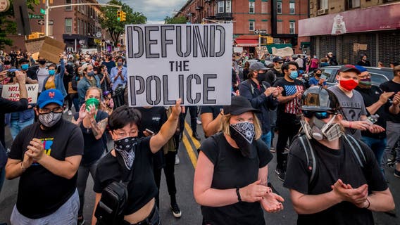 When protesters cry 'defund the police,' what does it mean?