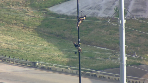 Maintenance worker rescued from flag pole in Farmers Branch