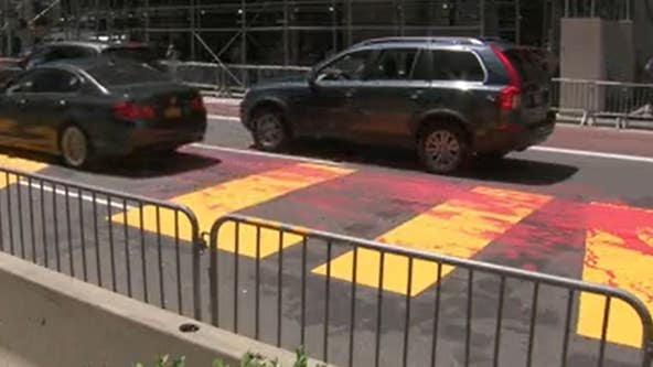 Red paint splattered over Black Lives Matter mural outside Trump Tower