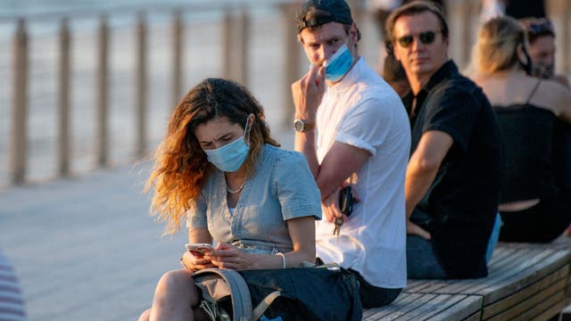 2nd US virus surge hits plateau, but few experts celebrate