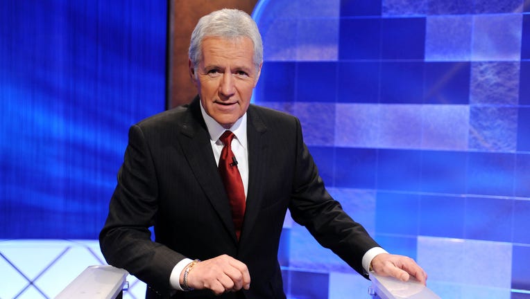 Game show host Alex Trebek poses on the set of the 