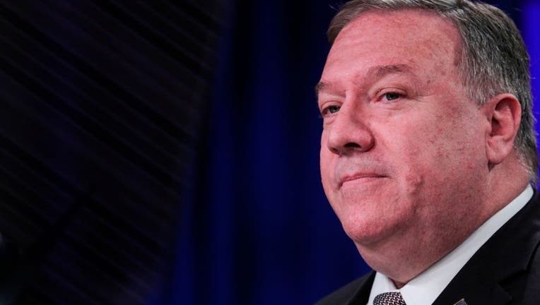 FILE - US Secretary of State Mike Pompeo speaks during a news conference at the State Department in Washington, DC on July 8, 2020.