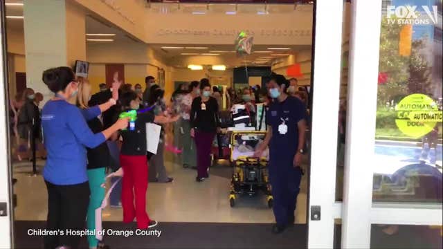 Hospital staff cheers as 13-year-old COVID-19 survivor is discharged after 57 days in ICU