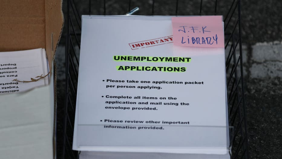 7ce76e2f-People Line Up For Unemployment Applications In Hialeah, FL During COVID-19 Crisis