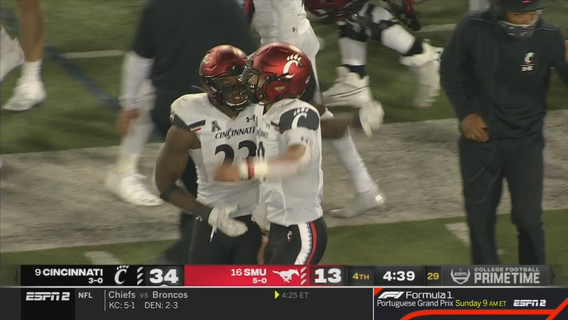 Ridder runs, passes No. 19 Cincinnati past No. 16 SMU, 42-13