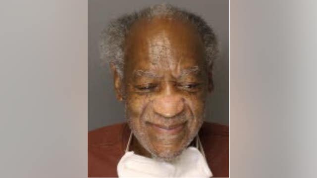 Bill Cosby appears to be smiling in latest mugshot