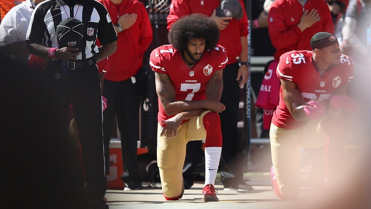 Colin Kaepernick kneeling