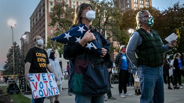 US COVID-19 cases surge past 100K for 3rd day in a row, according to Johns Hopkins