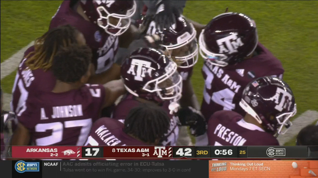 Mond leads No. 8 Texas A&M to 42-31 win over Arkansas