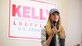 Loeffler campaign: Senator had 'no idea' she posed with neo-Nazi