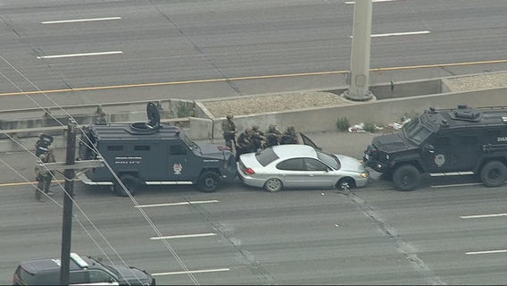 Standoff blocking traffic on I-20 in Dallas County ends with suspect's arrest