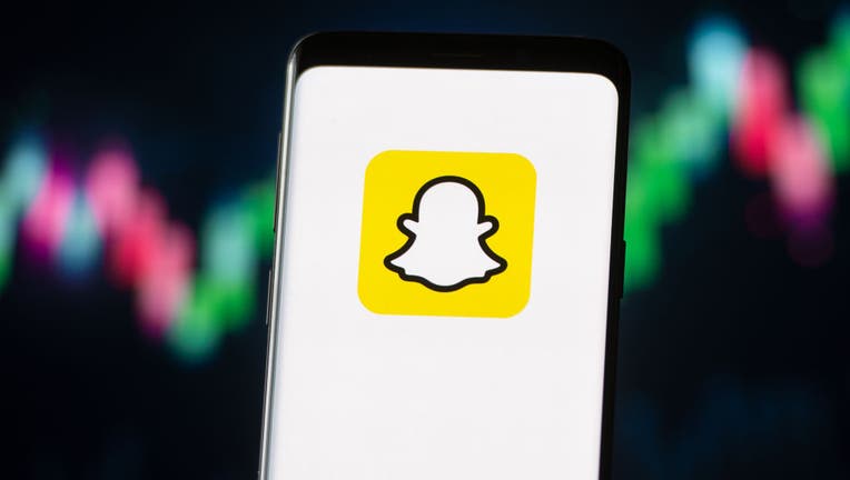 43ba3a9d-In this photo illustration a Snapchat logo seen displayed on