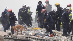 Rescuers couldn't save woman trapped in condo collapse rubble who pleaded for help, fire chief says