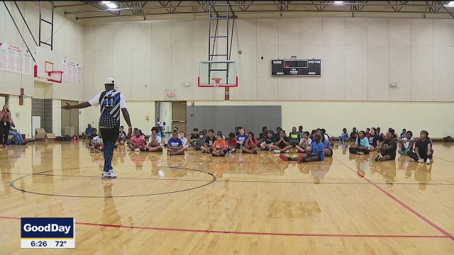 Grand Prairie police connect with youth through free sports camp