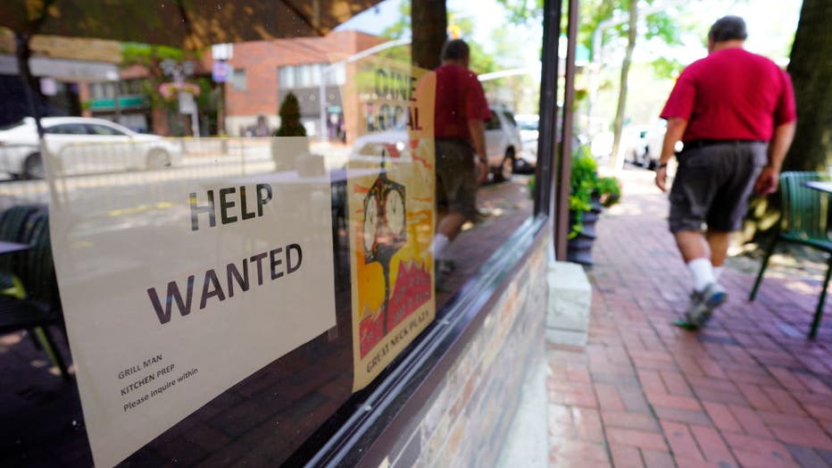 FILE - Restaurant storefront has a "Help Wanted" sign in the window on July 15, 2021, in Long Island, New York. (Photo by Chris Ware/Newsday RM via Getty Images)