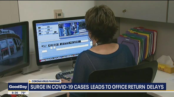 Surge in COVID-19 cases leads to office return delays