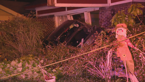 Police searching for driver who crashed car into Dallas home