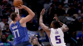 Luka Doncic hits long 3, Mavericks holds off Kings 105-99