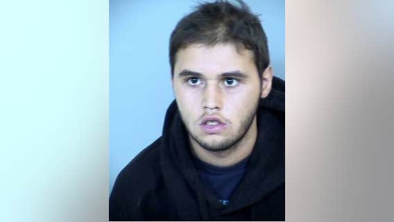 Mesa homeowner finds naked intruder inside house, holds him at gunpoint until police arrive