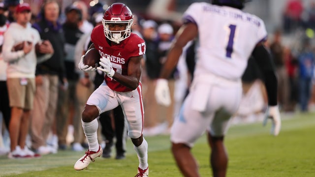 No. 4 Oklahoma beats TCU 52-31 in Williams’ starting debut