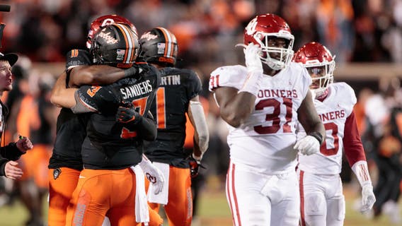 Sanders leads No. 7 Oklahoma State past No. 10 Oklahoma