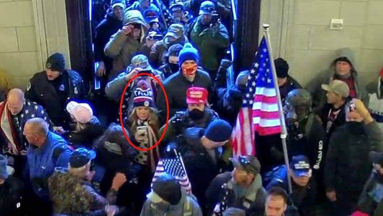 Jennifer Ryan (center) is pictured at the U.S. Capitol on Jan. 6, 2021. (Credit: U.S. Attorney’s Office)