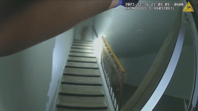 Dallas police officer fires gun after kicking in door of apartment