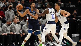 Wolves beat Dallas 111-105; Mavs lose Porzingis to injury