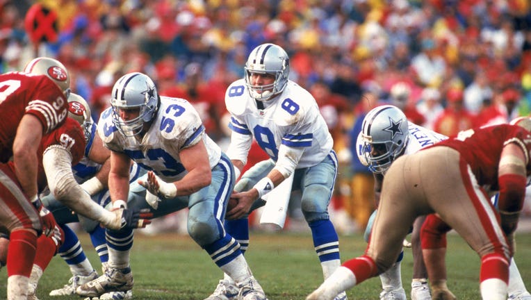 Dallas Cowboys quarterback Danny White (11) walks the sideline