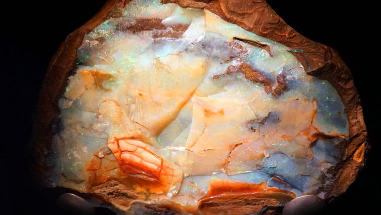 Precious opal, in Ironstone nodule.