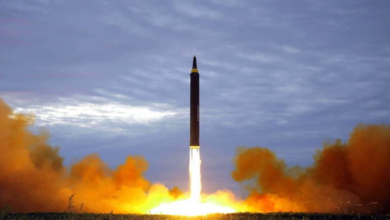 TOPSHOT-NKOREA-SKOREA-JAPAN-MISSILE-DIPLOMACY