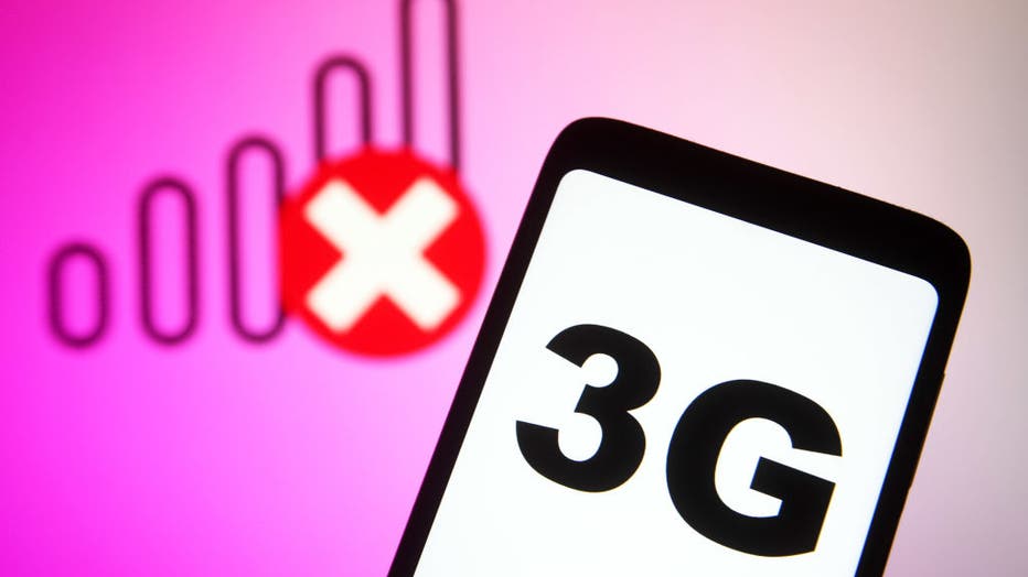 In this photo illustration, a 3g sign is seen on a