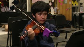 Irving engineering students create prosthetic to help middle schooler play violin
