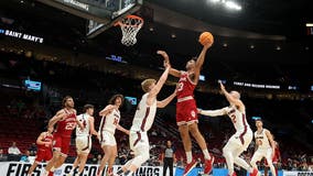 Indiana cheerleader saves March Madness game after freeing stuck basketball