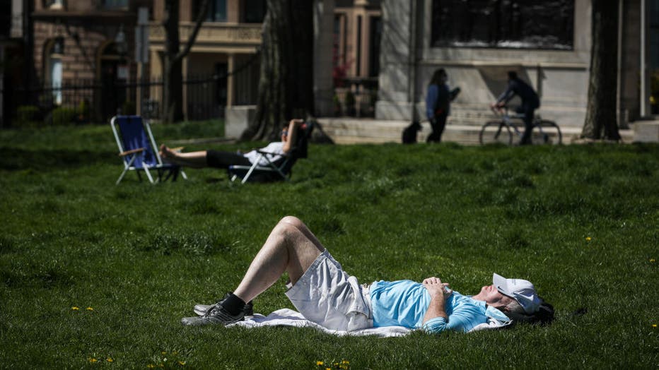 People Enjoy Rising Outdoor Temperatures During Pandemic