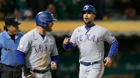 Rangers rally in 9th again to beat A's 8-5 for 3rd in row