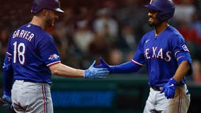 Semien homers twice, Rangers split twinbill with Guardians